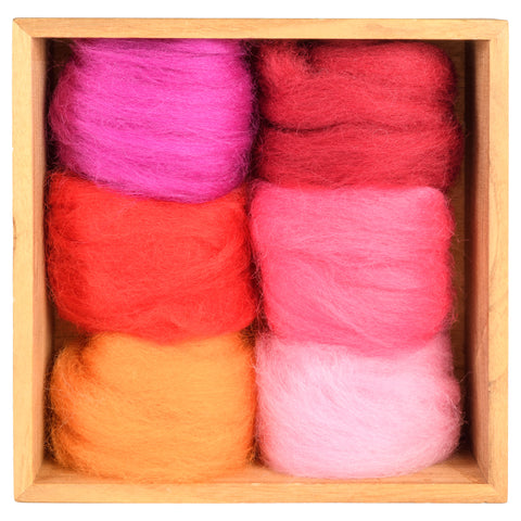 a wooden box filled with lots of different colored yarn