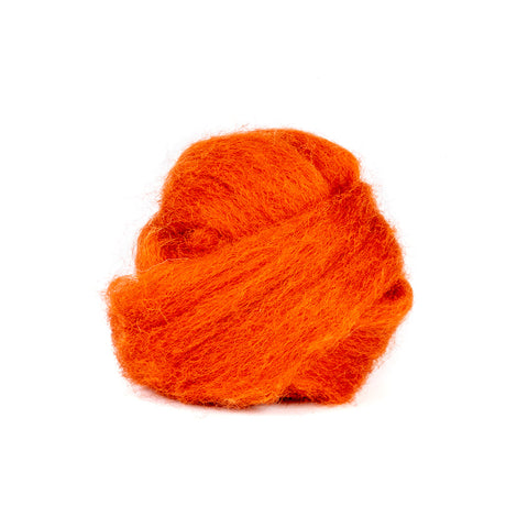 a ball of orange yarn on a white background