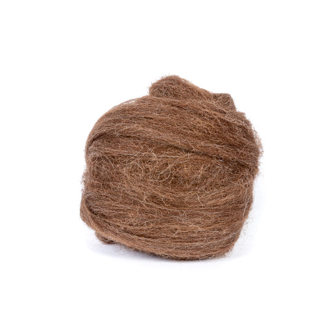 a ball of brown yarn on a white background